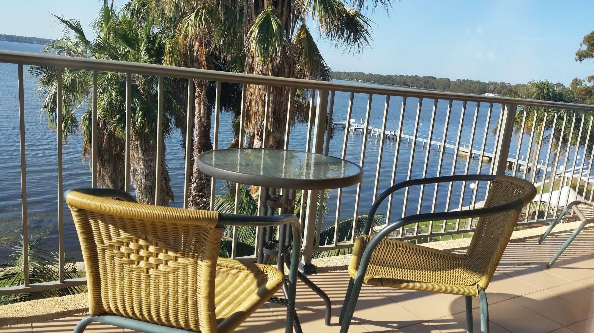 بيتش كومبر هوتل توكلي المظهر الخارجي الصورة View of the Gulf of Mexico from the balcony of a hotel room at the Lake Marion Resort