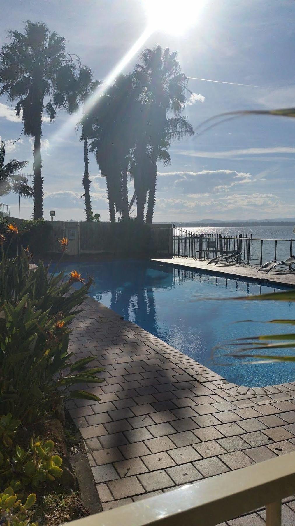 بيتش كومبر هوتل توكلي المظهر الخارجي الصورة View of the pool at the hotel
